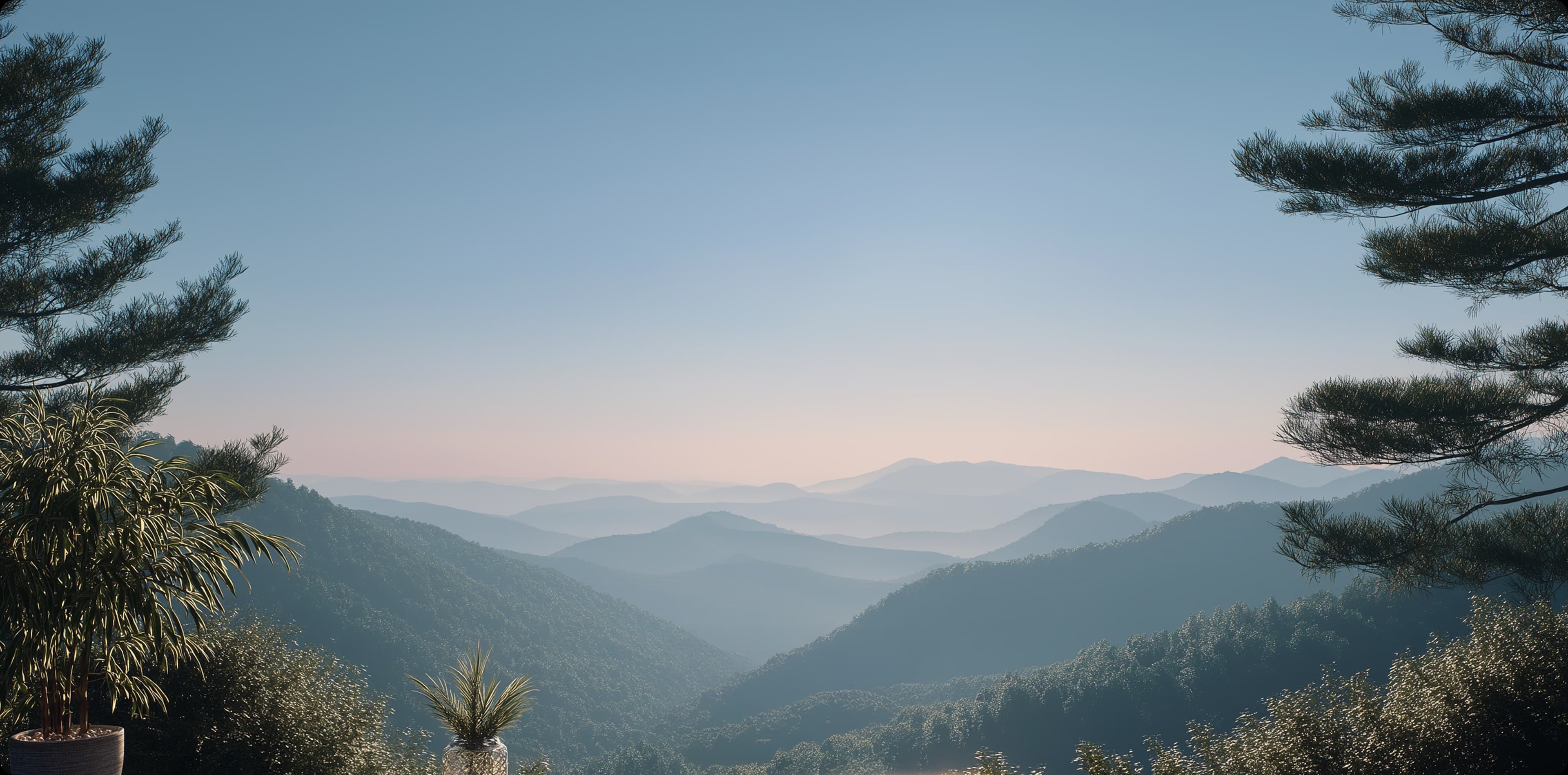 Dawn skies over rolling mountains